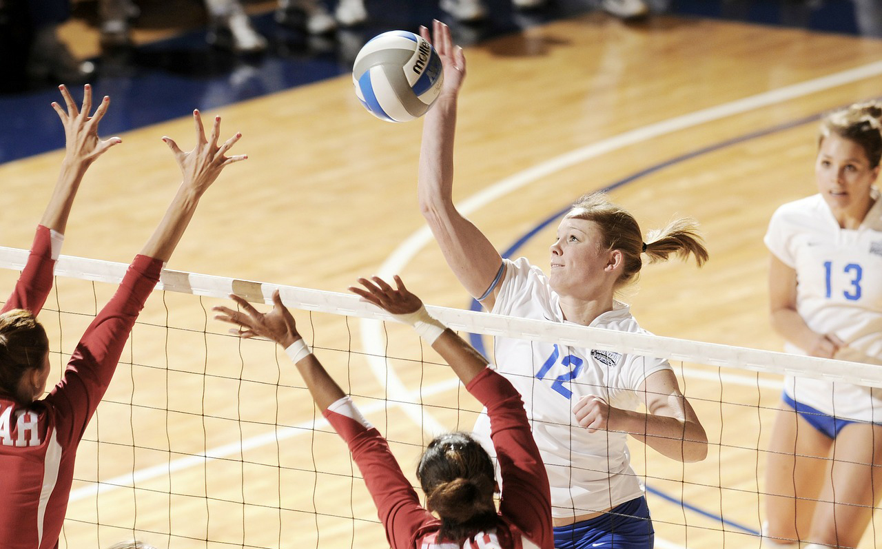 girls playing volleyball